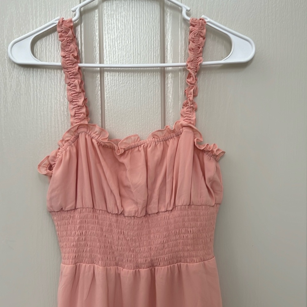 This soft peach is sooo feminine. Elastic underneath the breast. So flattering